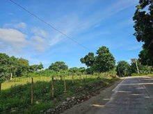 Load image into Gallery viewer, Overlooking lot for sale near highway &amp; beaches in Guindulman Bohol Philippines