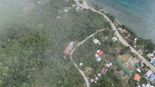 Load image into Gallery viewer, Overlooking lot for sale near highway &amp; beaches in Guindulman Bohol Philippines